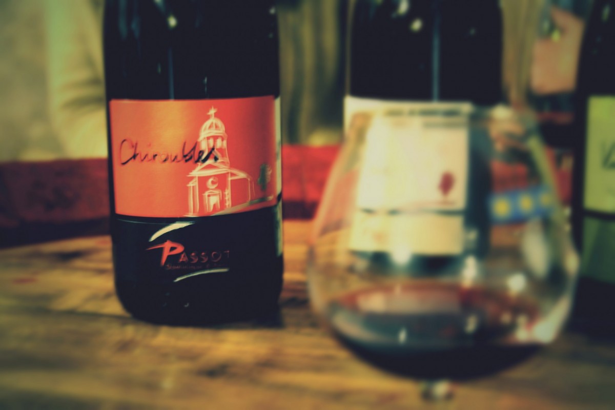 Bottle of Domaine Passot Chiroubles with a wine glass