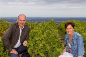Dominique and Remy Passot sitting in their vineyard in Chiroubles