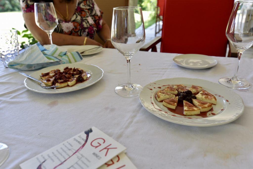 Two plates of greek food at the house of George Kitos, Greek winemaker