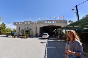 Nana Lykou standing in front of her winery in Evia, Greece