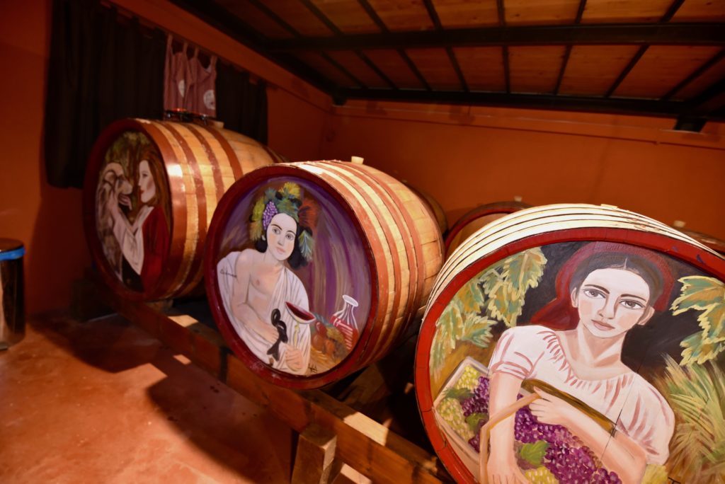 Painted wine barrels in Lykos winery in Evia, Greece