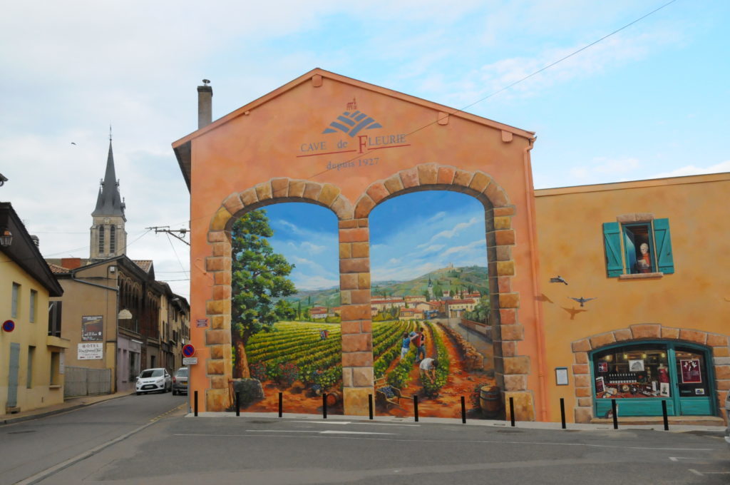 Caveau in Fleurie in Beaujolais with a mural on the wall