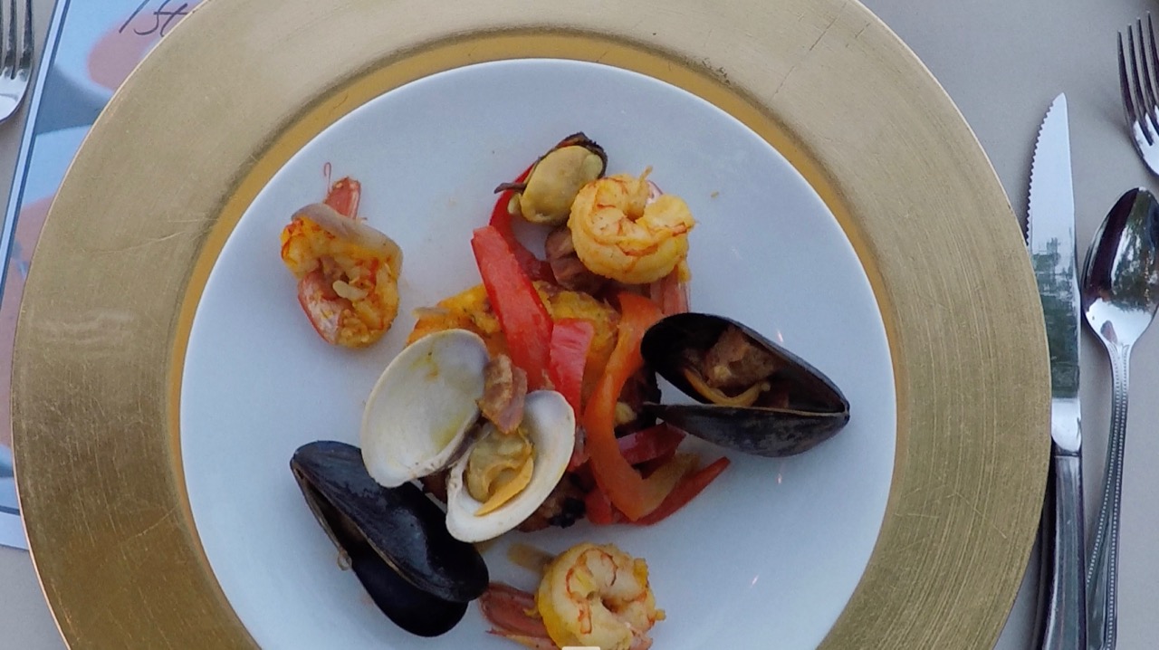 Plate of seafood paella with saffron