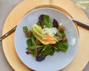 Plate of salad at the 15th hole dinner of Lakeridge golf course