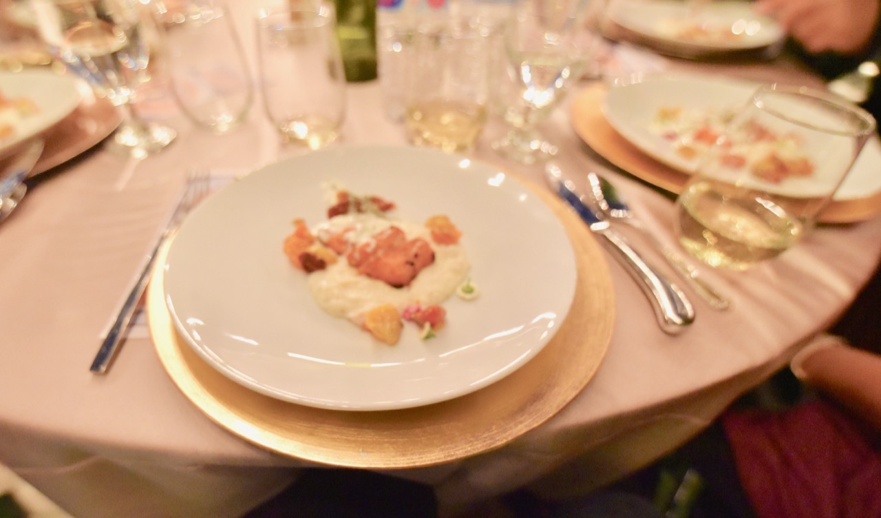 Plate of grilled salmon on polenta at the 15th hole dinner, Lakeridge golf course