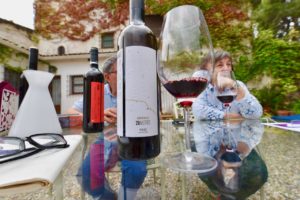 Bottles of wines and wine glasses on a table