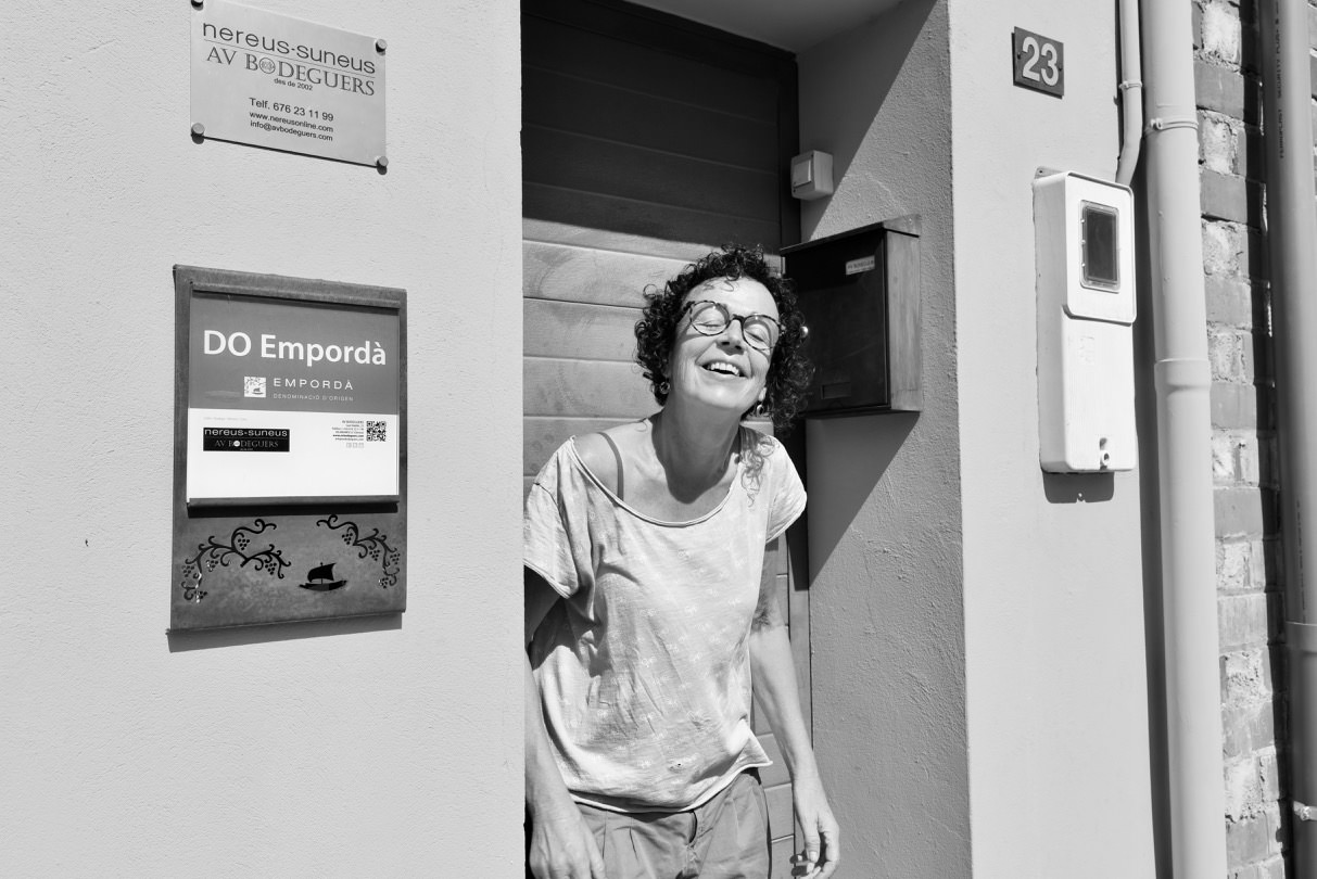 Woman standing in a doorway of AV Bodeguers winery.