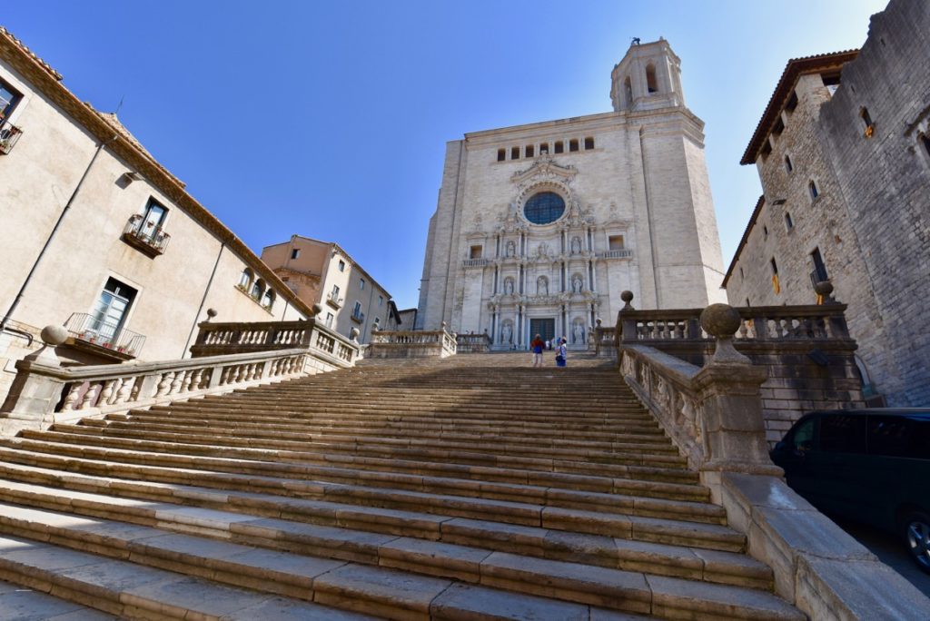 A Cathedral in Girona, Spain with steps leading up to it.