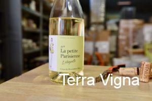 Bottle of white wine on a table.