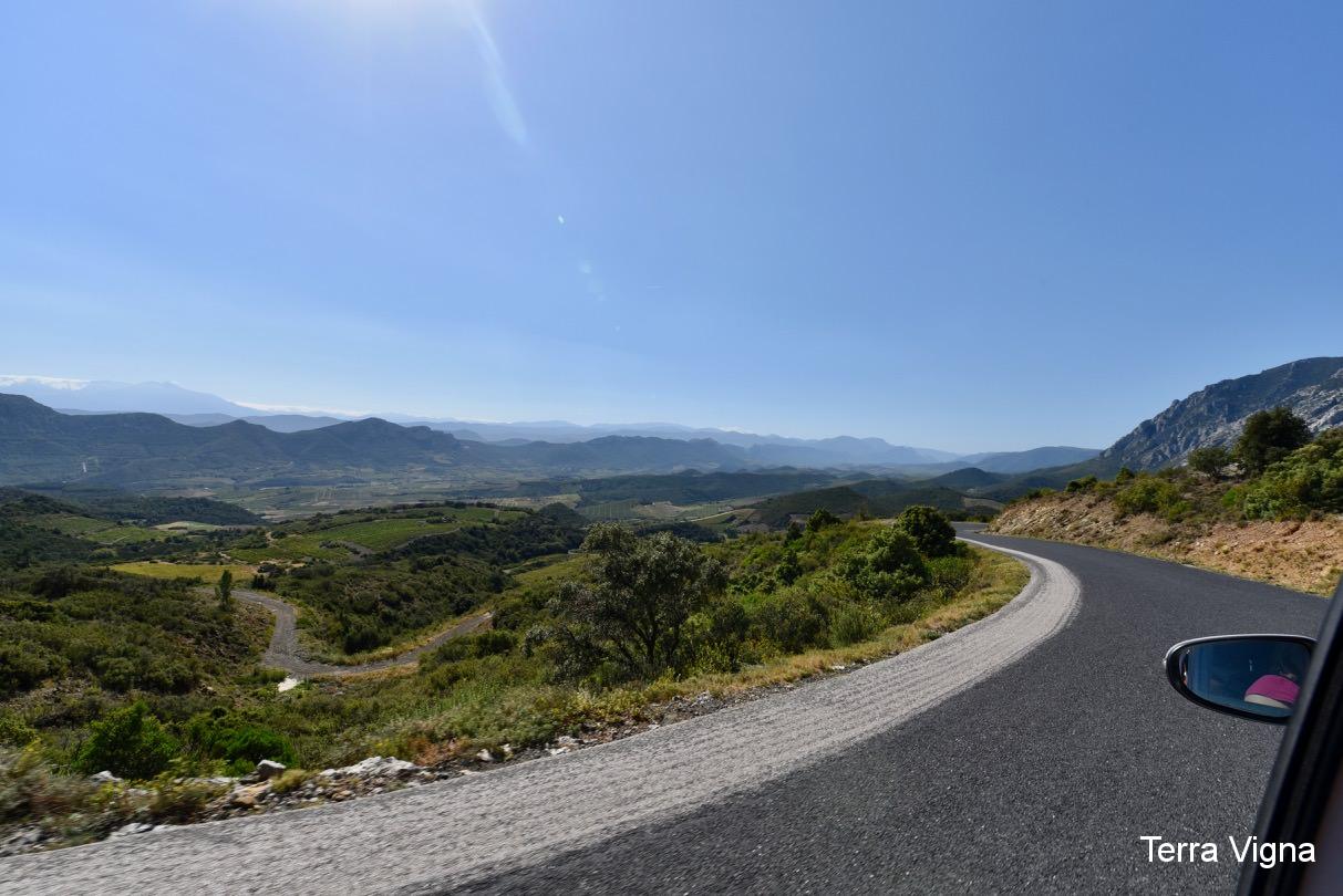 Majestic view of mountains from a road.