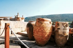 Clay amphoras behind a rope