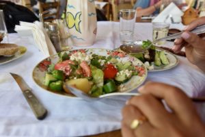 Greek salad on a plate.